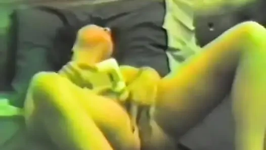A horny brunette jerking off with two dildos