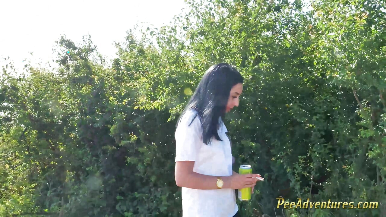 Sexy Brunette Trying Hard to Empty Her Bladder Outside, Then Quick Pee Next to a House in Construction