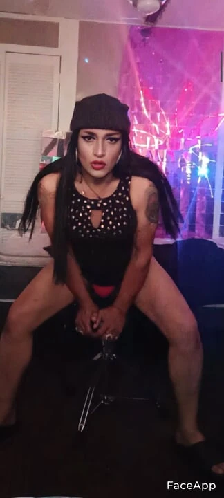 Crossdresser fucking a dildo
