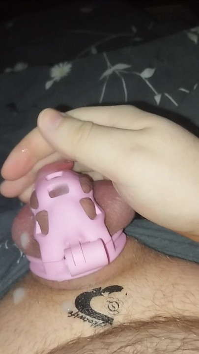 Cum in chastity cage watching BBC porn