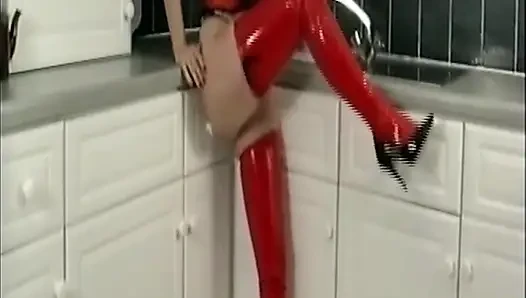 Red Latex Babe Fingers Her Dripping Wet Pussy