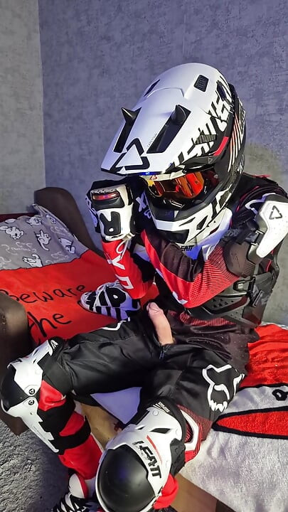 An Excited Guy in Motorcycle Gear Fucks His Sneakers