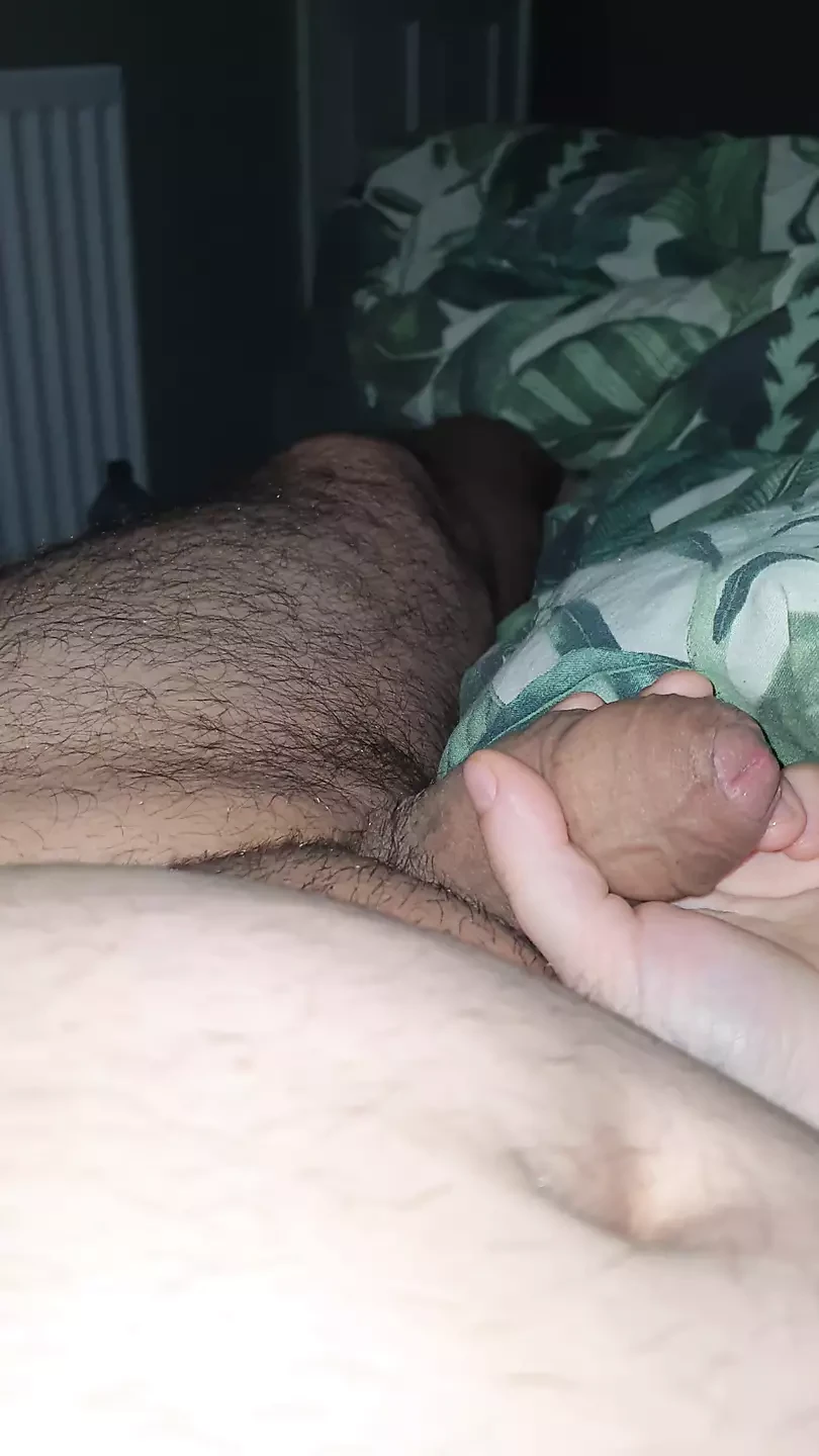 Step son laid down in bed get a handjob from step mom