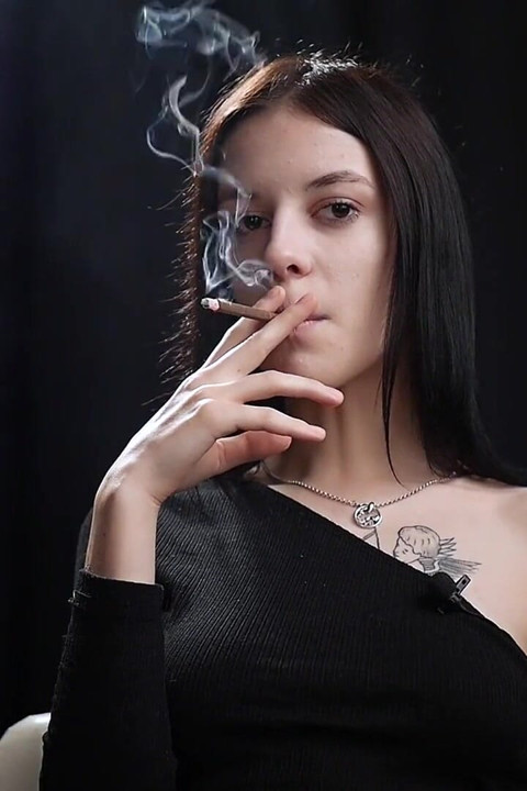 Slim Chick Is Smoking One Red