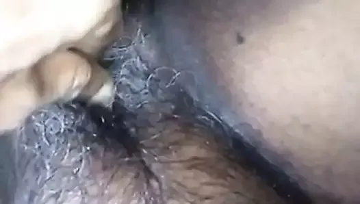 Fingering wet and hairy pussy