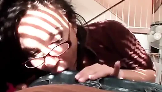 Sexy babe in glasses gives head to this dude with the long dong