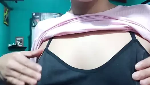 Selene touches herself in the bathroom