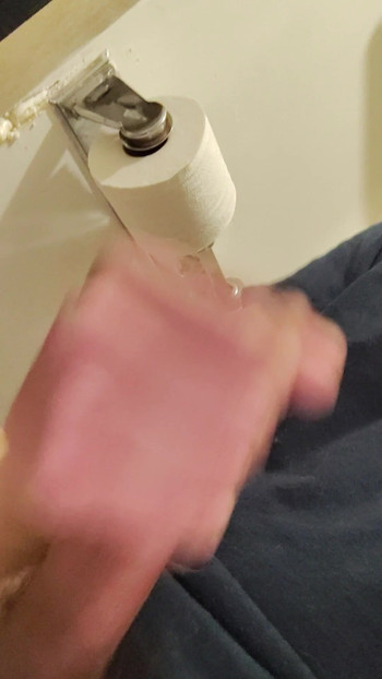 just a guy busting a load to porn