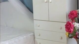 Guy fucks her her tits and pussy in the bedroom