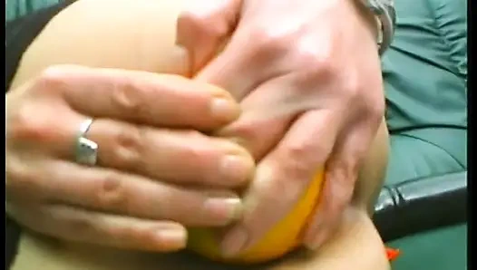 Brunette mature slut wearing stockings while drilling her holes with food and huge candle