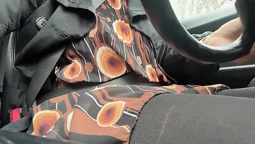 Elegant stepmom drives to the office wearing tights and a beautiful dress