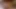 Lesbian in Bed in the Morning with Fingers Licking Double Dildo