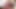 Blode schiebt sich den schwarzen Dildo rein