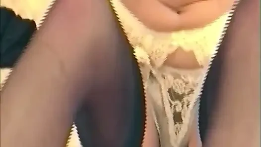Brunette Strips Lingerie Revealing Big Tits on Bed