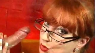 Redhead milf gives  blowjob