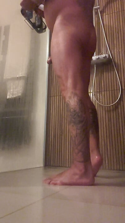 Horny showering with cumshot