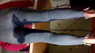 Emma pissing and working in tight jeans