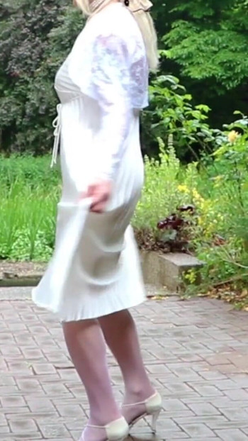 Epic moment from "Severe Caned In A Pleated Satin Gown"