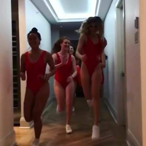 Genie Bouchard and friends running in Baywatch swimsuits