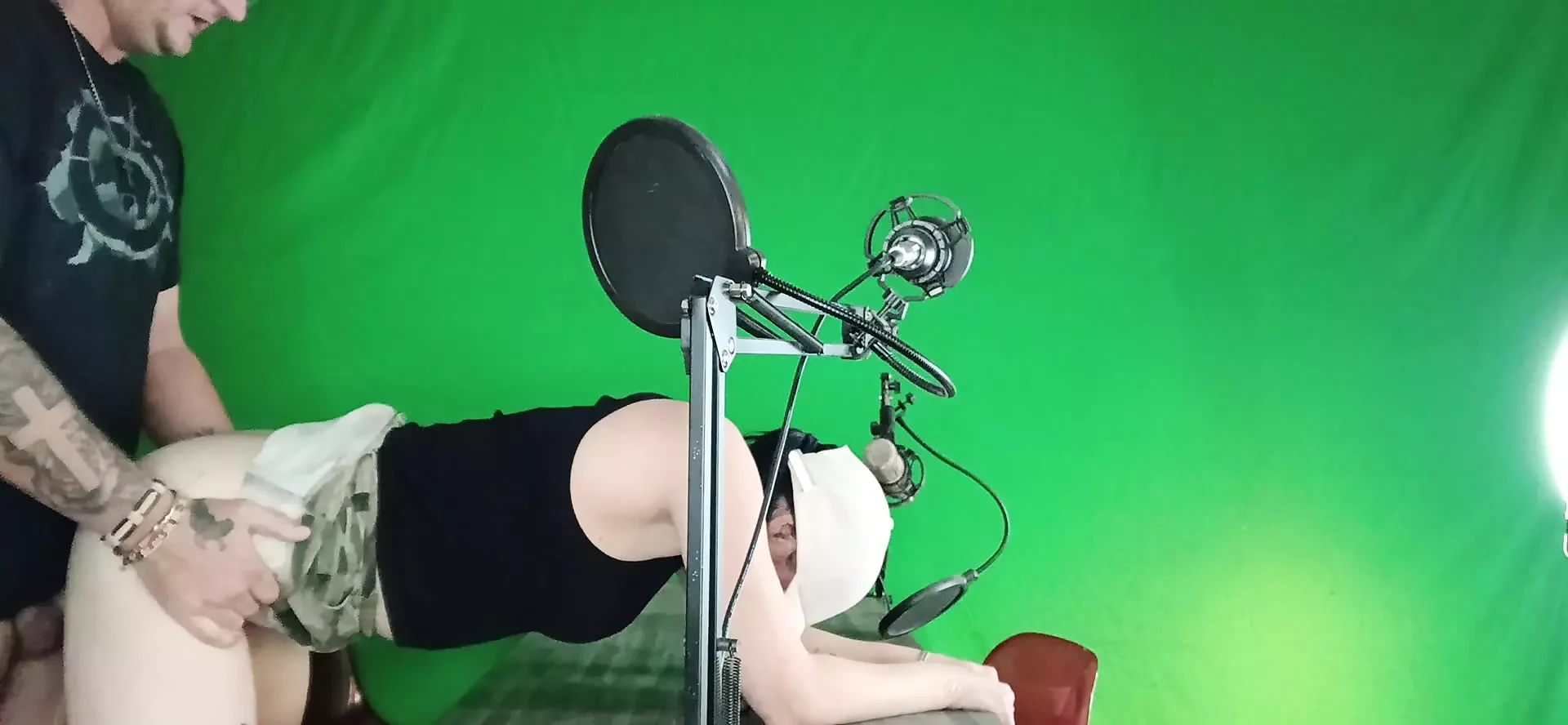 Me and my steps sit in front of the green  screen