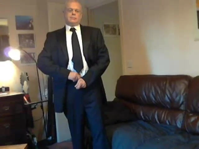 Wank in suit