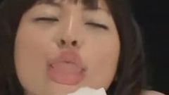 Japanese girl licks a mirror.