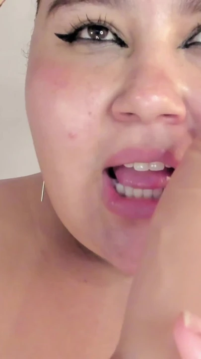 Chubby fills her mouth and throat with an XL dildo