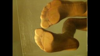 Sheer nylon feet soles show