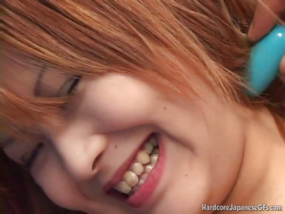 Asian solo teen toys her pussy
