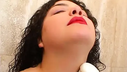 Brunette masturbates in the bathroom