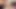 Side view of skinny very hairy uncut white guy fucking a long-haired Latina sex doll on the couch and cums on her ass