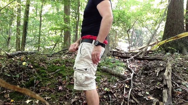I am wanking in the woods, jerking off and cum on my shorts!