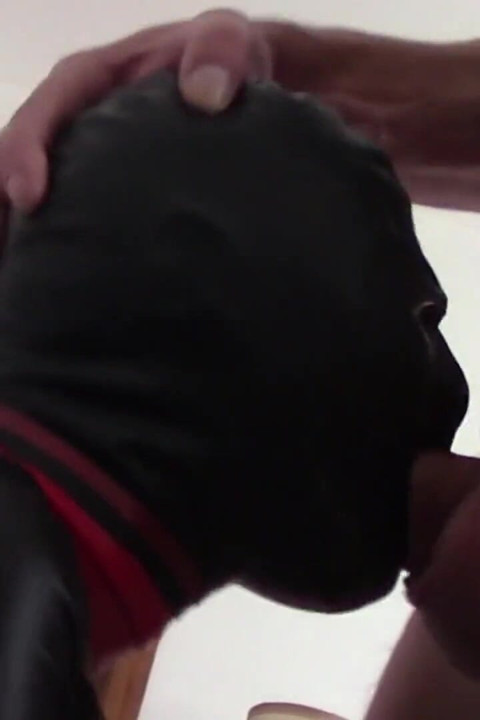 Laura hooded in a very close view of a great blowjob action with ring gag and huge cum swallow