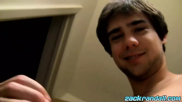 Athletic jock Zack Randall masturbates and cums on his abs