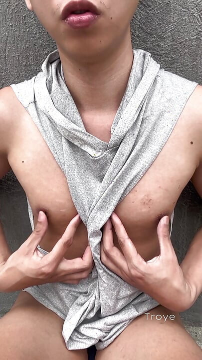 Cute Asian takes a morning walk at the park and masturbates