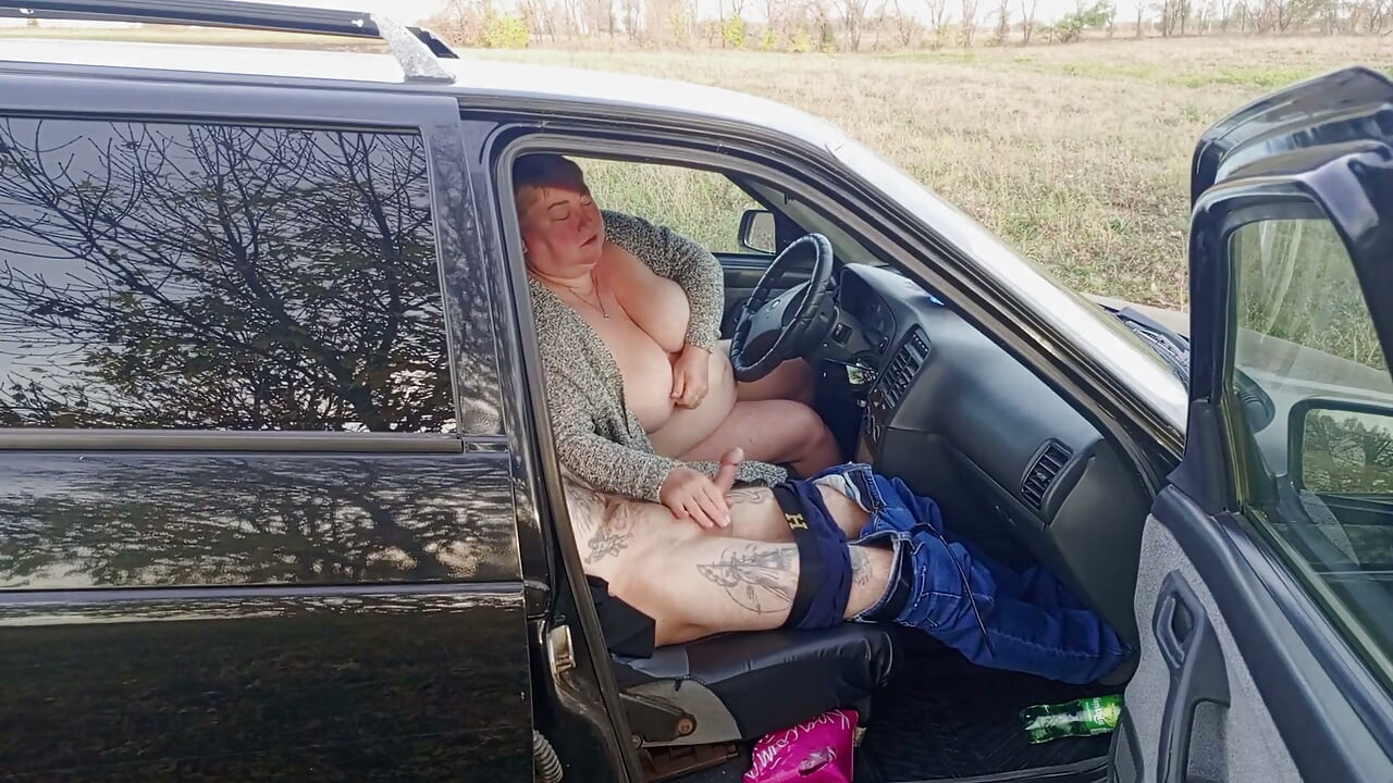 Jerking off a Dick in a Car in Nature