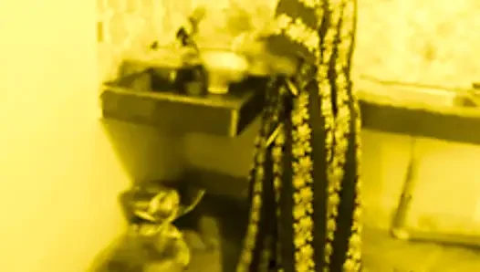 Busty MILF Desi Bhabi Has No Idea Her young Devar see Secretly in the kitchen room.
