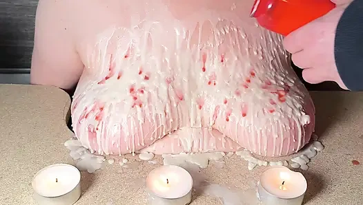 Breasts with hot candle wax and then beat