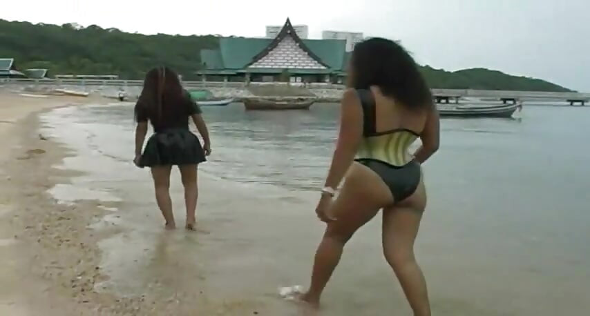 2 sexy Latina's presenting latex fetish in the pool and on the beach