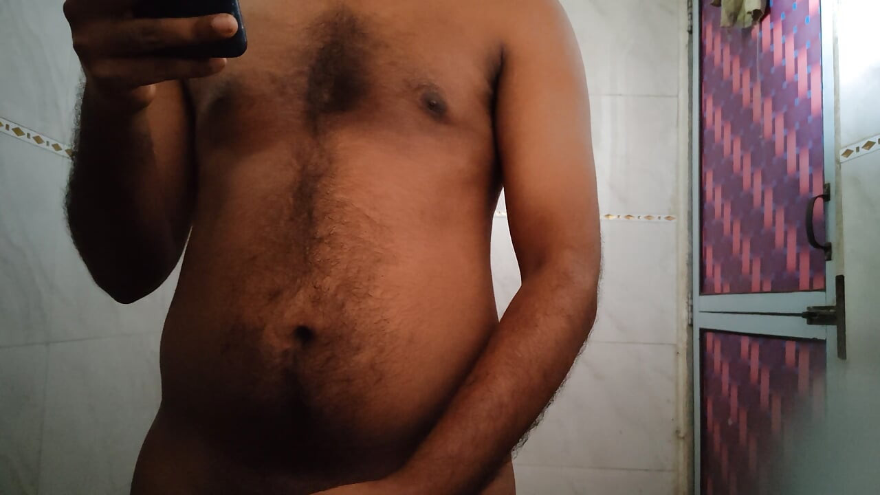 Stroking my cock hard in bathroom