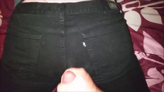 Cumshot on black jeans