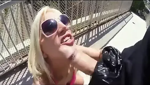 Blondie Fesser stroking and sucking that dick in public