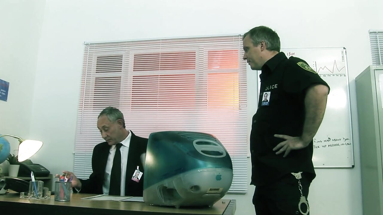 Big titted brunette gets fucked by two police officers
