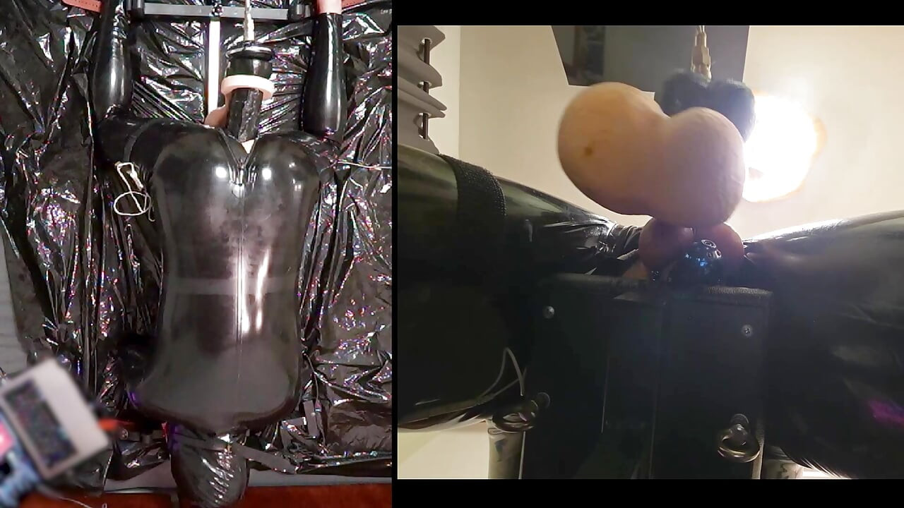 Session in the pillory with Latex Catsuit, PA Chastity, Giant Didildo and Estim