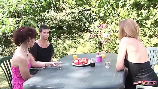 Four amazing MILFs kiss and lick each other before riding a couple of hard cocks