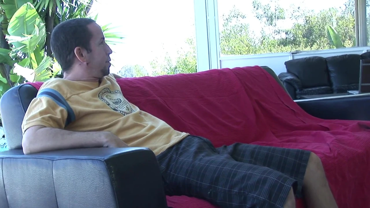 Blonde MILF with juicy tits rides a manly dude on the sofa