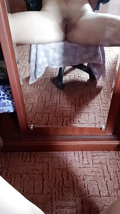 Alone at home in front of the mirror, POV masturbation with a dildo