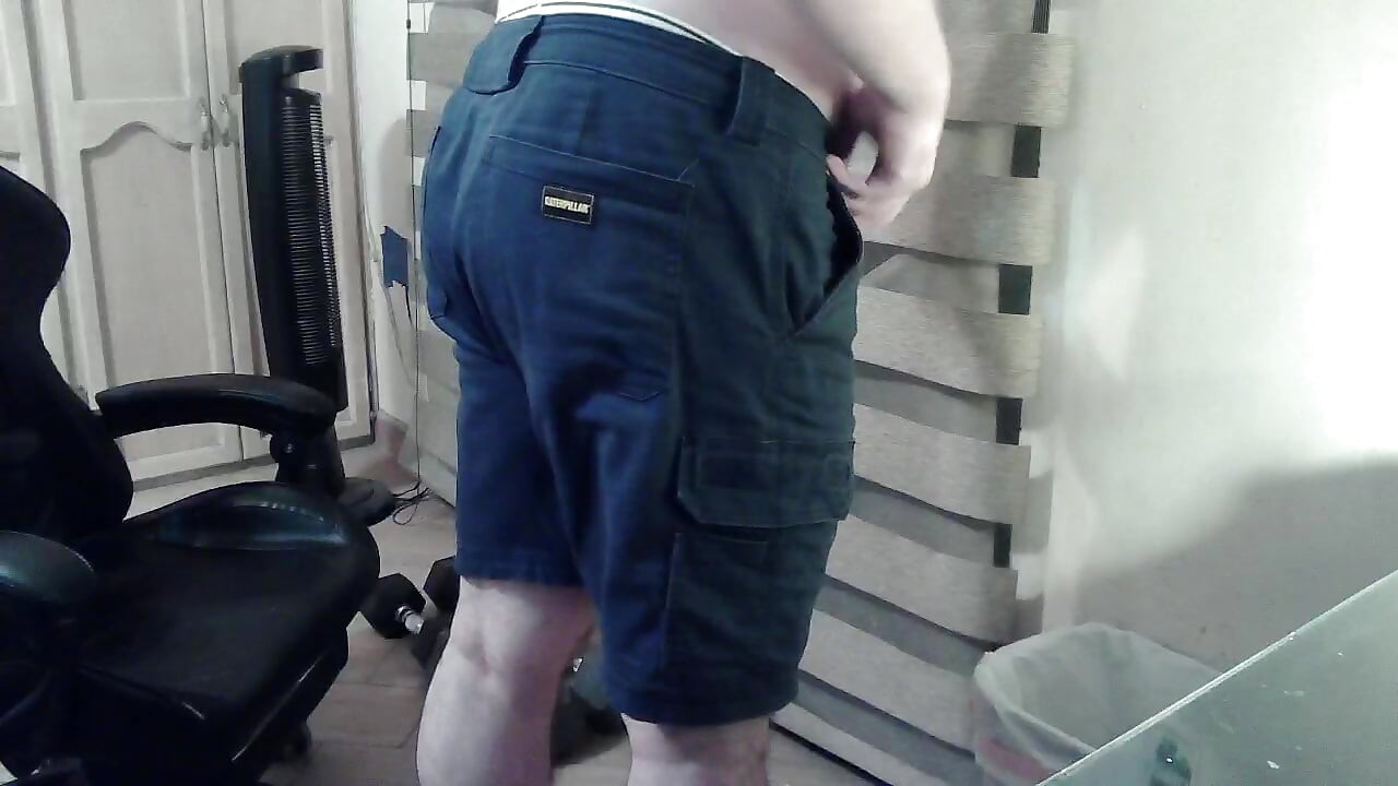 Hot camboy spanks himself during a ticket show