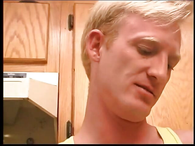 Sexy blonde fucks his friends face in the kitchen