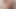 痩せた女の子が自分のアソコを指で愛撫し、その後ディルドで深く突く